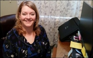 Kristina at her desk